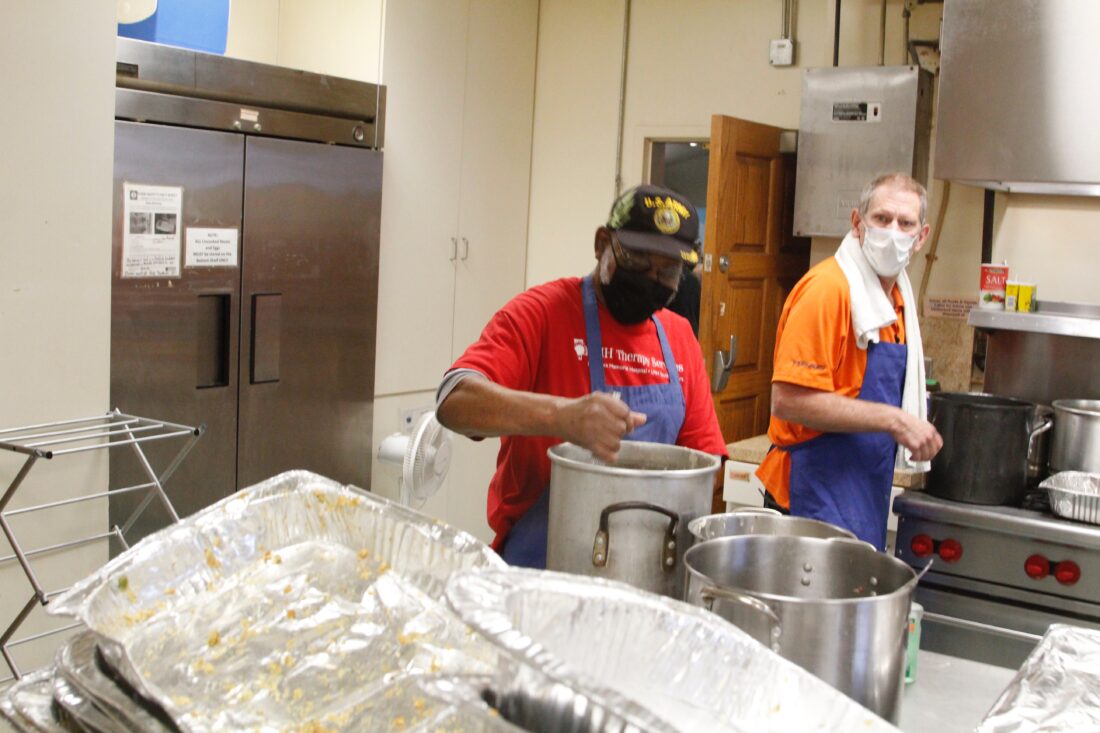 Volunteers prepare and serve nearly 1,000 meals for annual Community